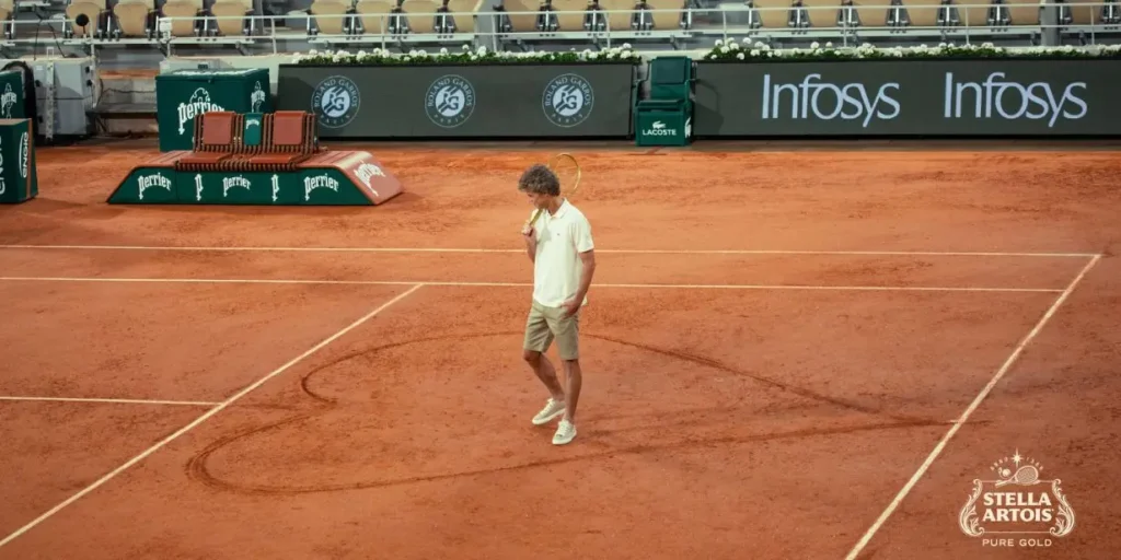 Stella Pure Gold convida Guga para redesenhar coração em Roland-Garros 